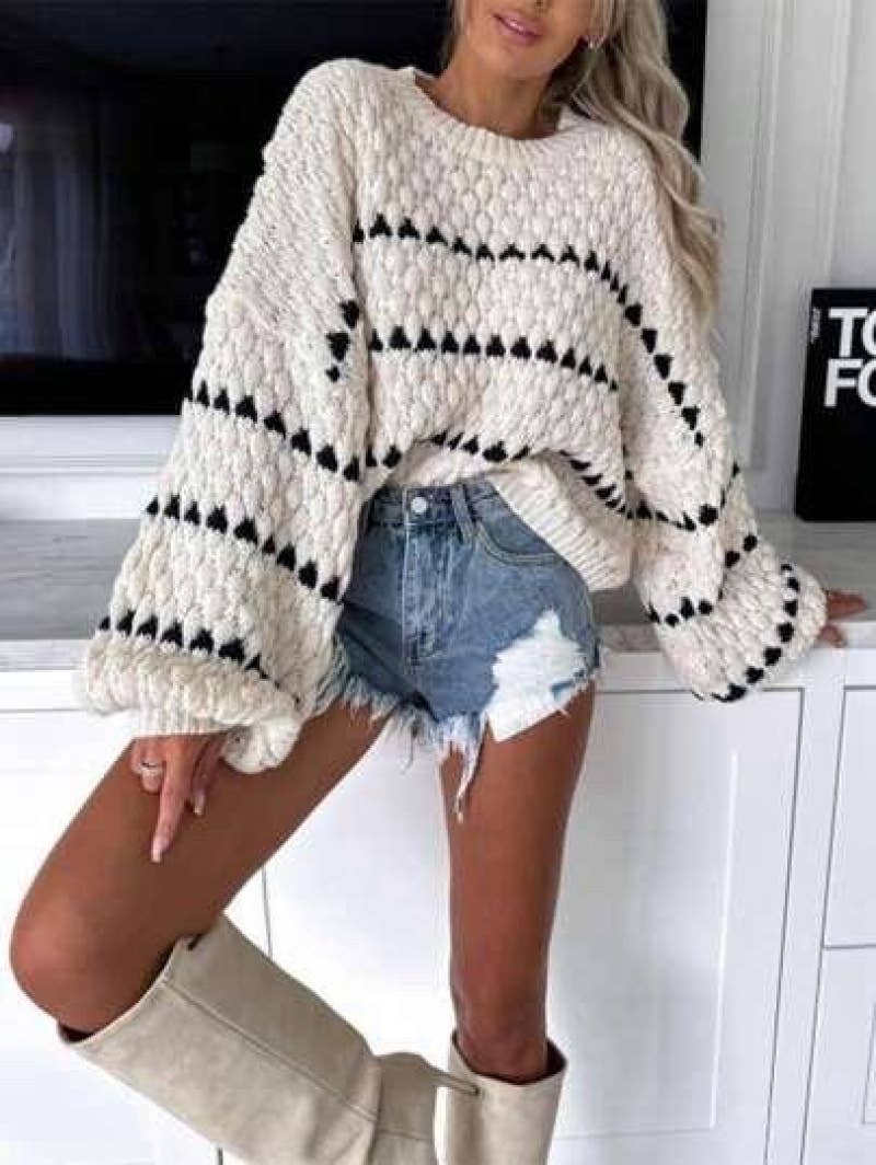 Wide striped sweater .