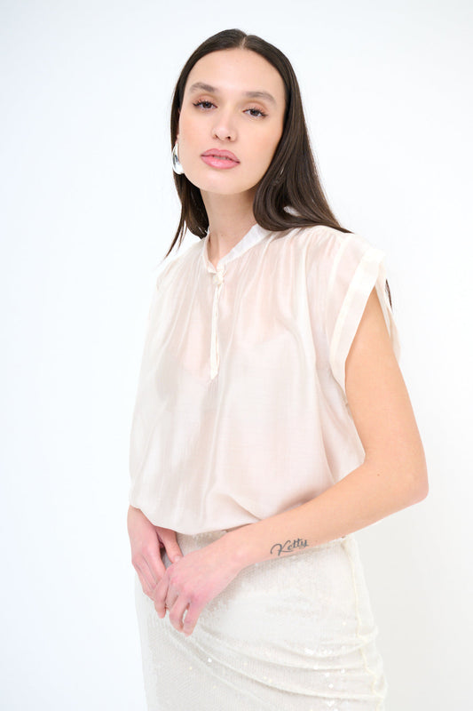 Flowy cap sleeve blouse with keyhole neckline