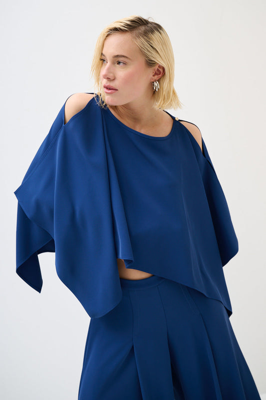 Flowing asymmetrical top.