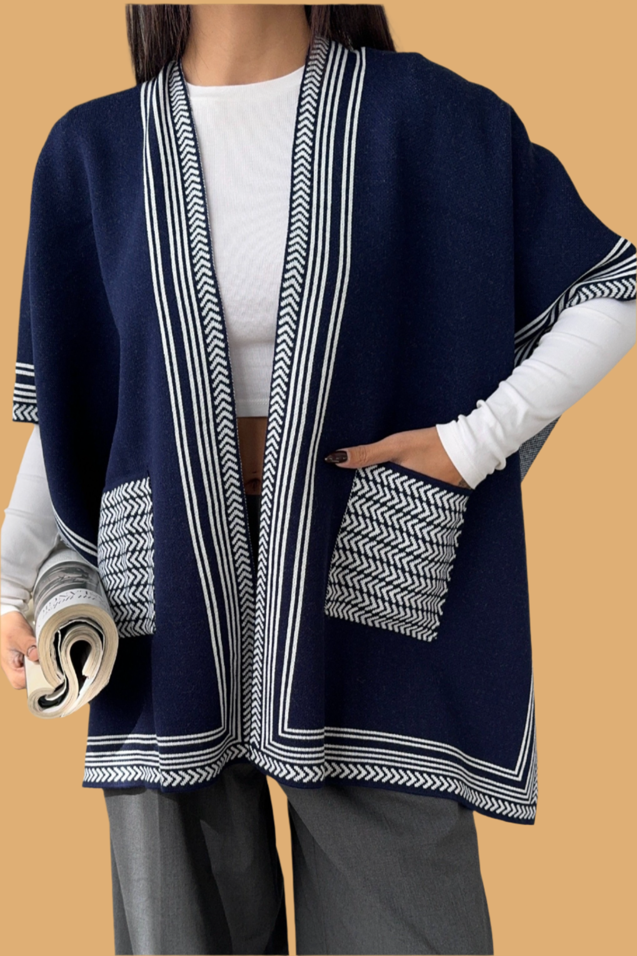 Knitted Cardigan/Poncho with stripe edge.