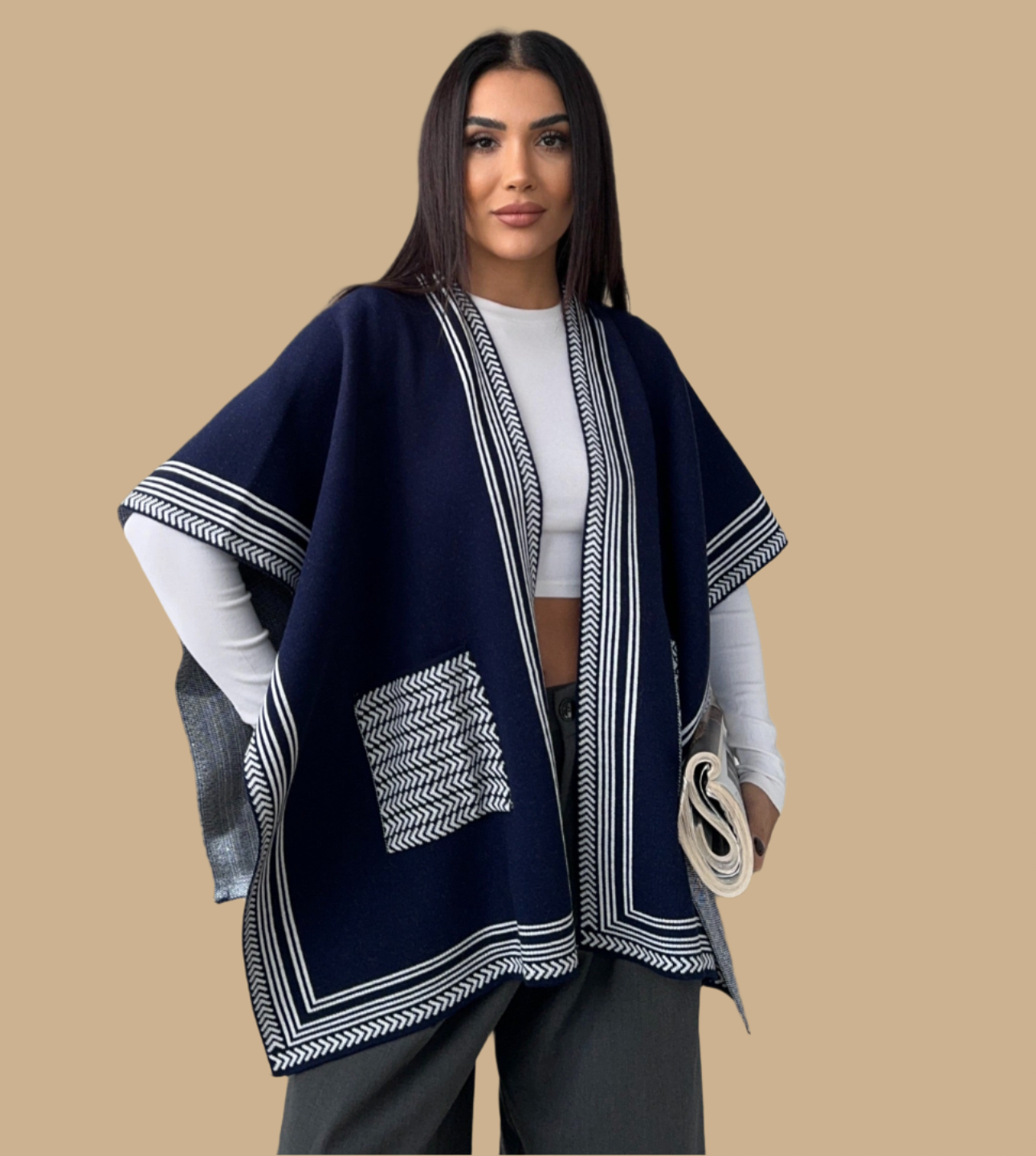Knitted Cardigan/Poncho with stripe edge.