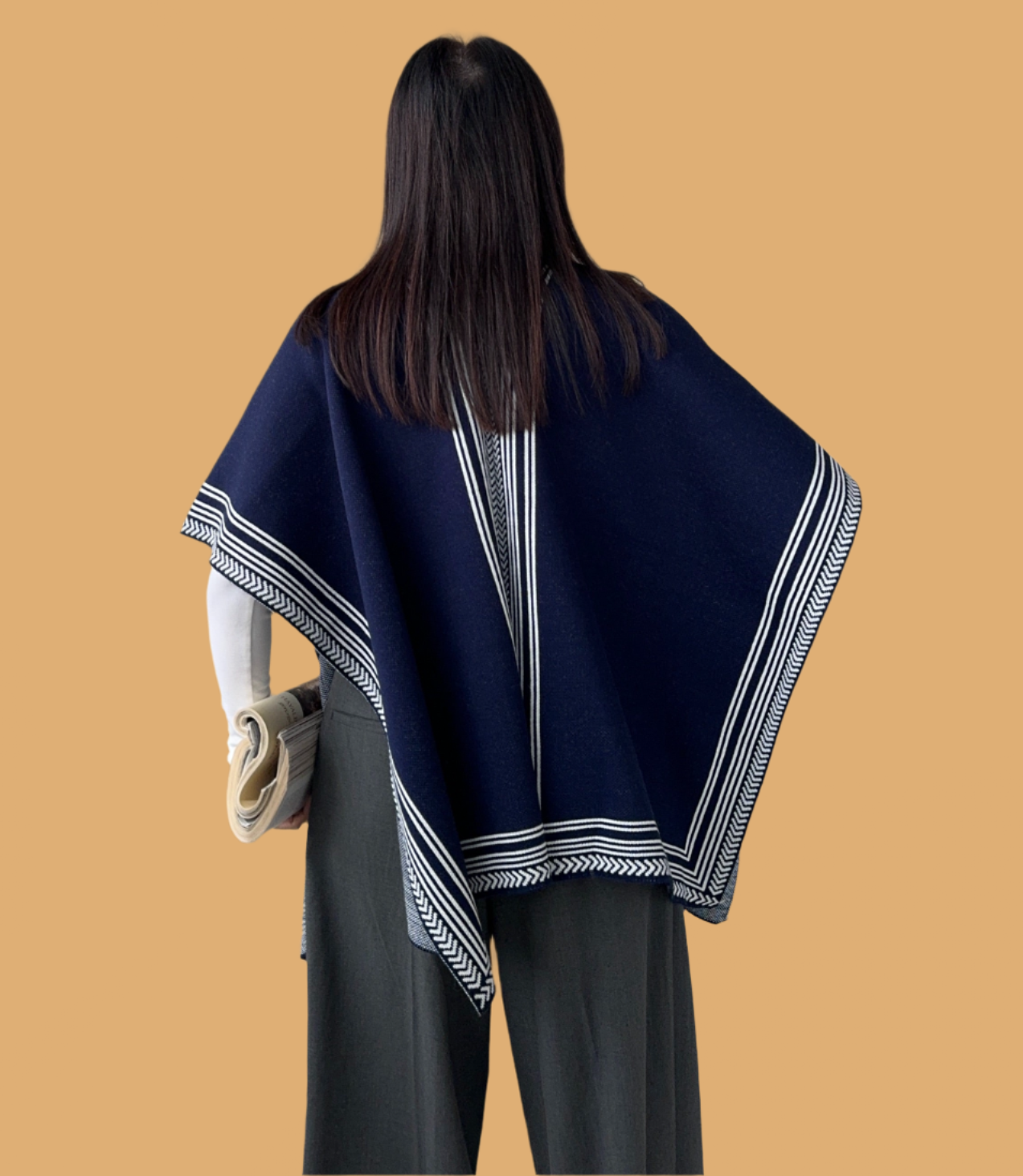 Knitted Cardigan/Poncho with stripe edge.